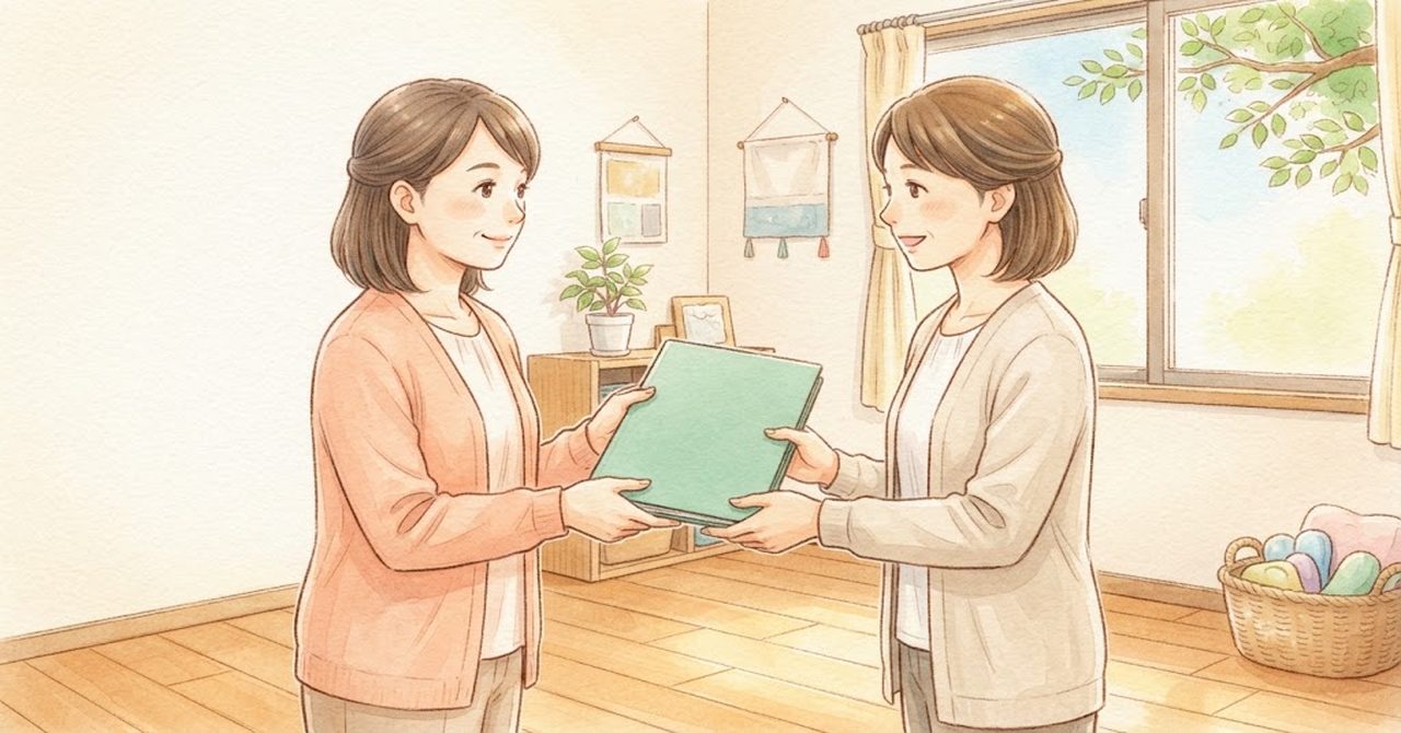 職員どうしがノートを手渡している絵