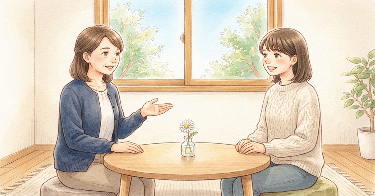 職員2人が机をはさんで話している絵